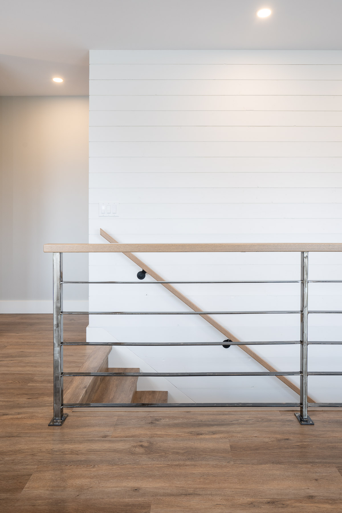 custom metal straight picket spindles on staircase