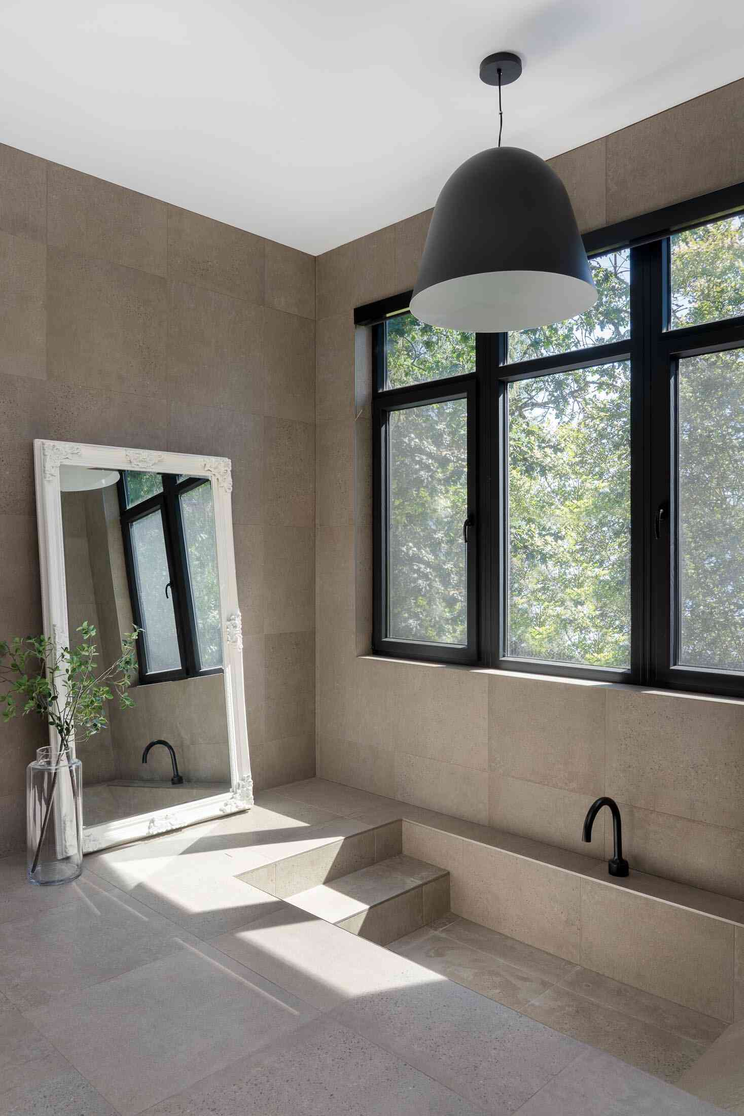 minimalist bathroom with sunken tub