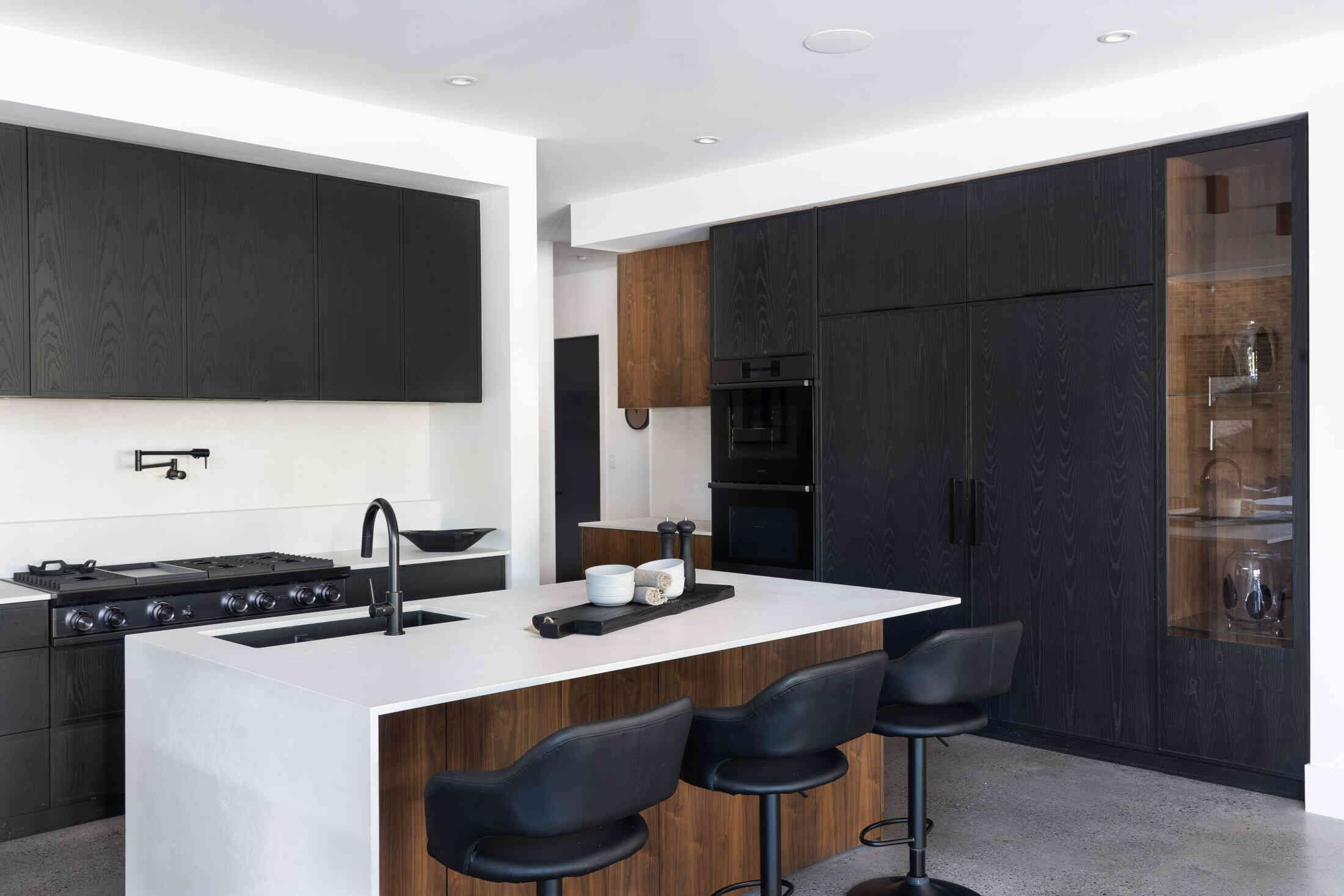 contrasting wood kitchen in walnut and black stained ash