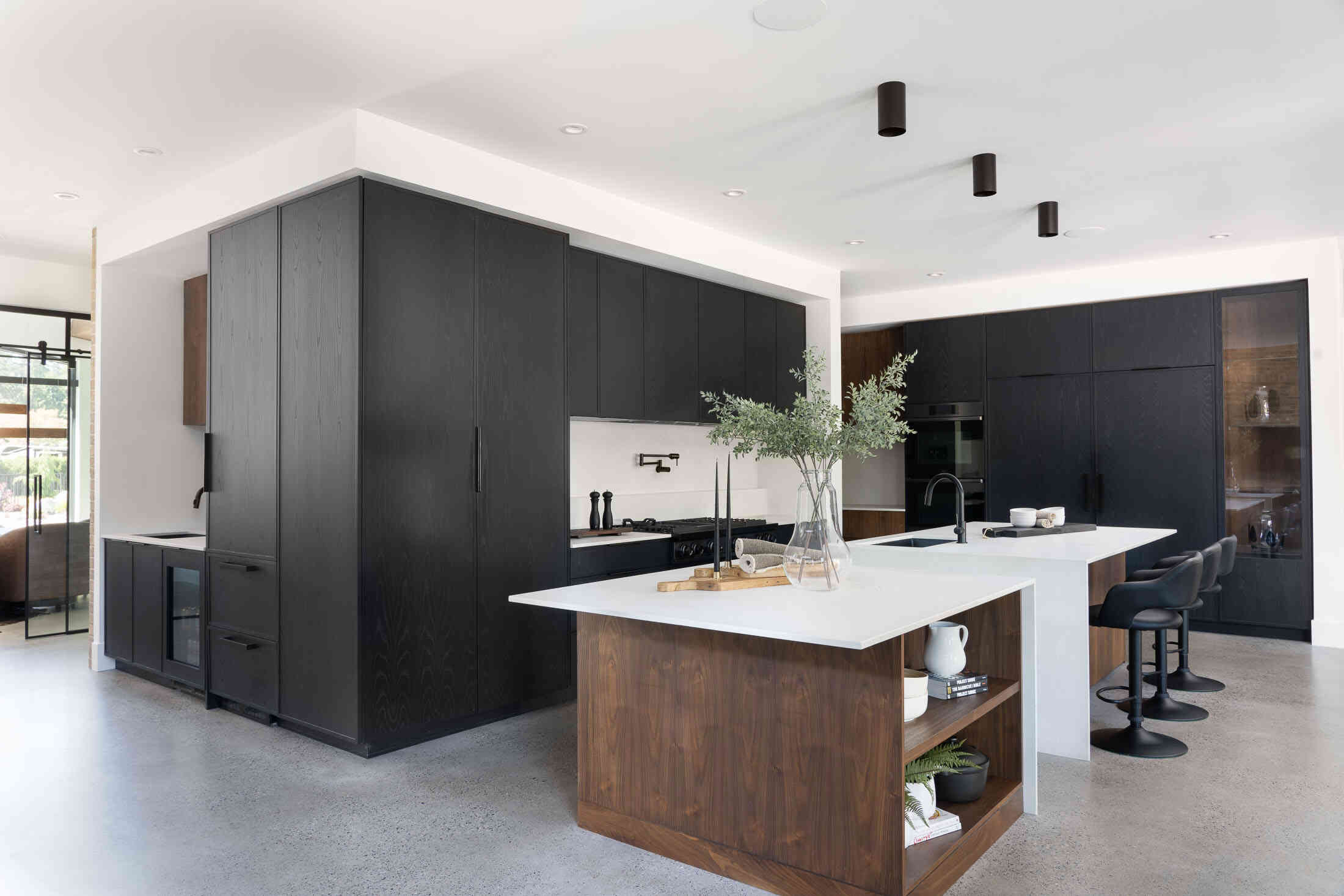 double kitchen island with waterfall edge