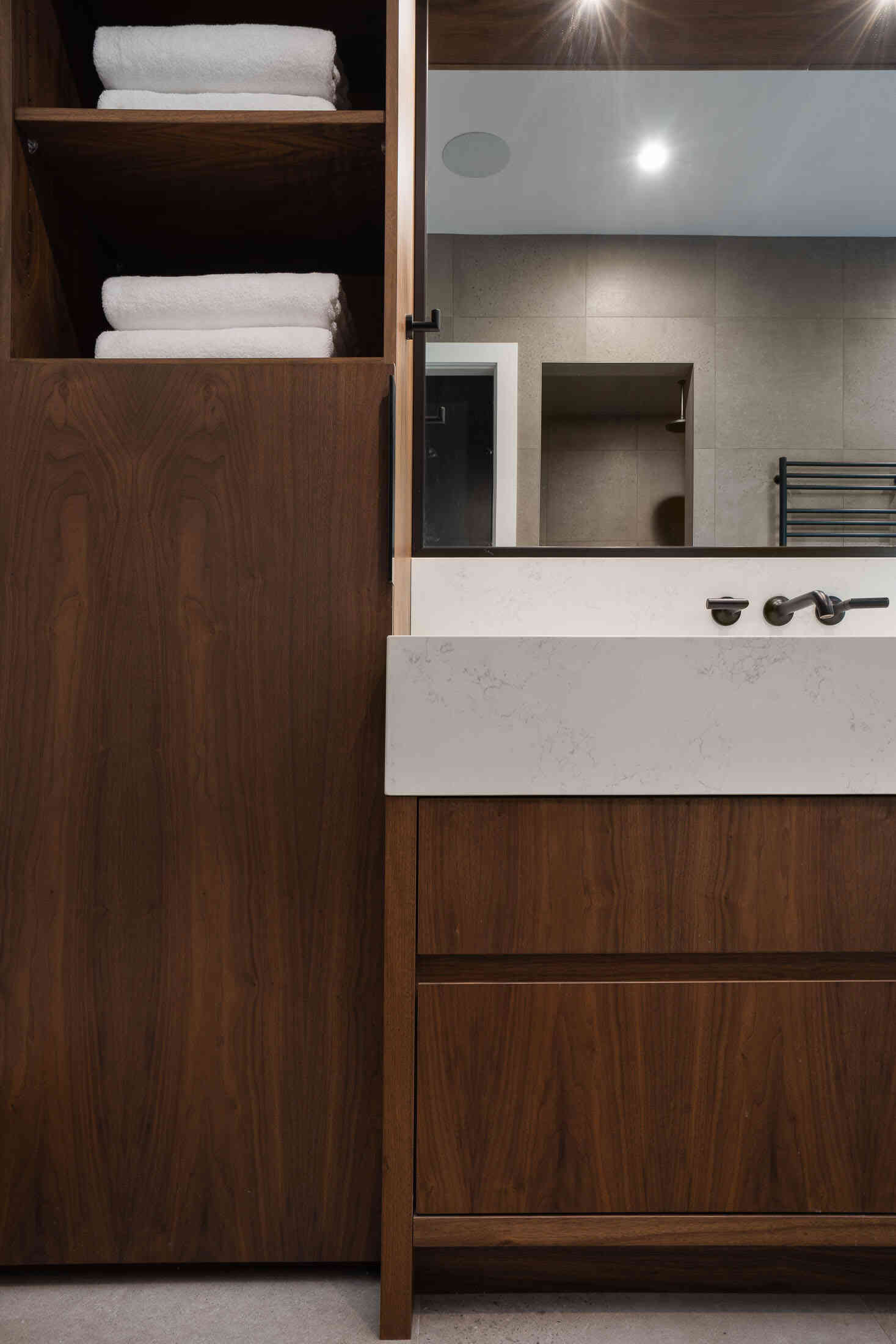 Walnut casework in bathroom