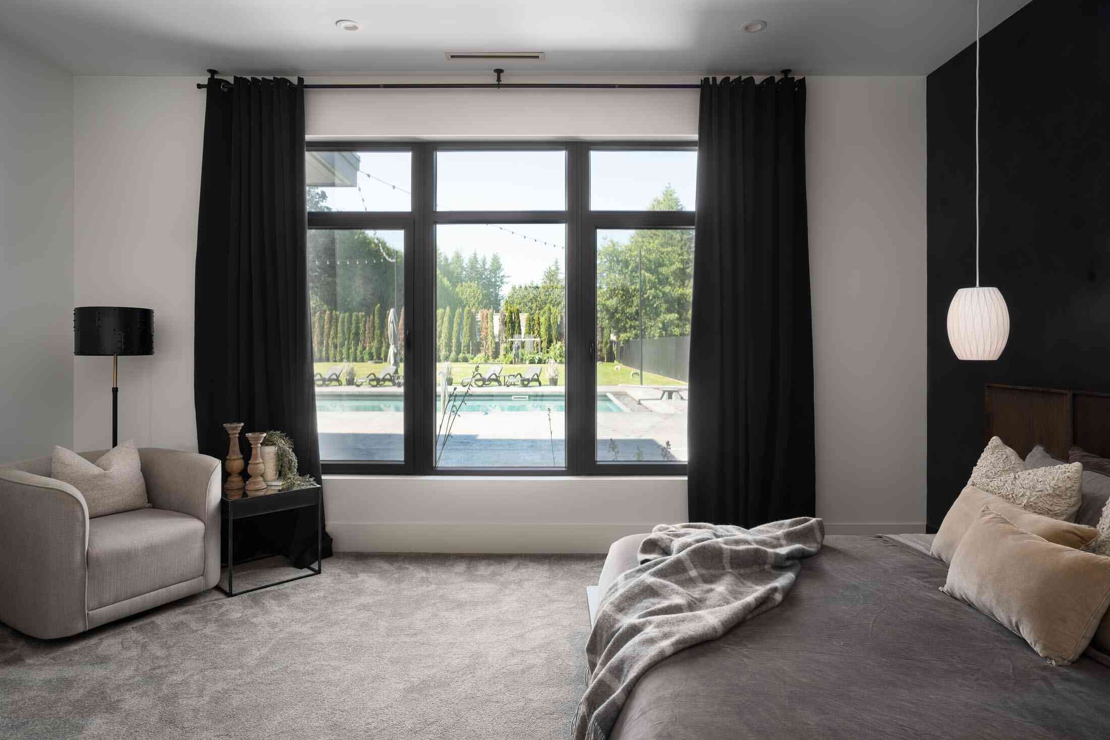 Main bedroom with view of pool