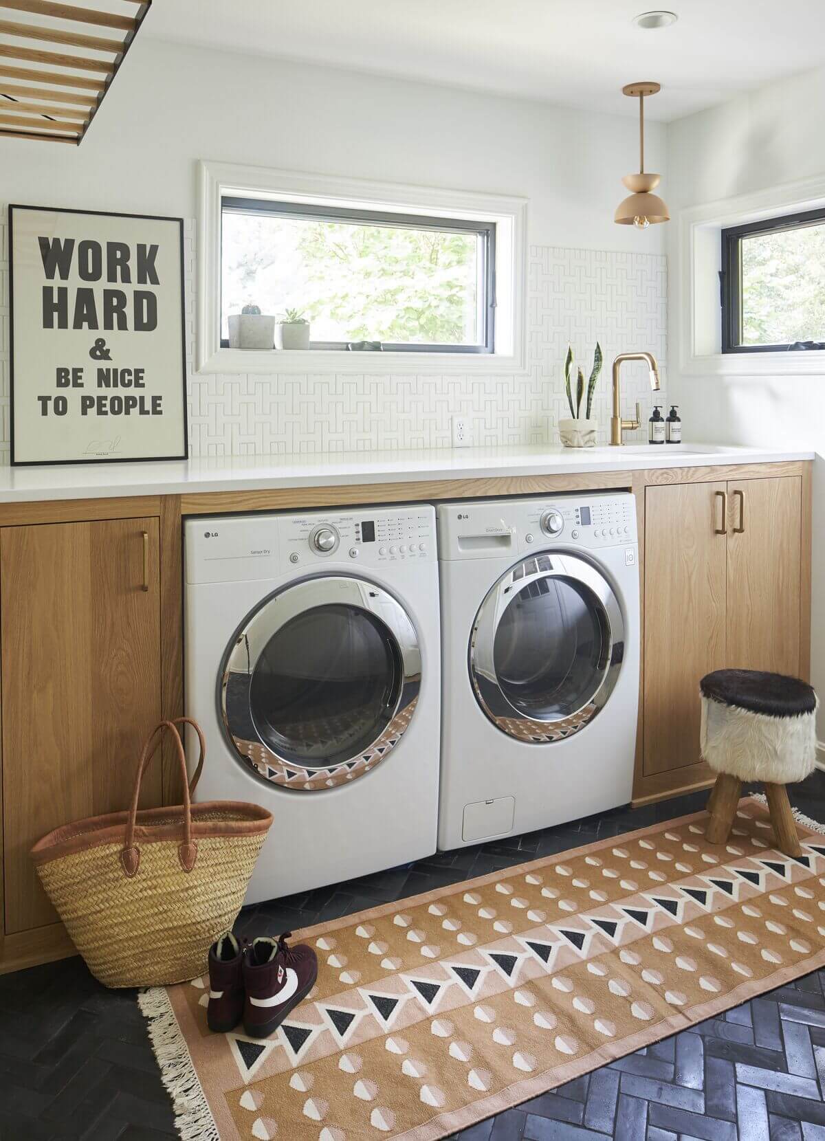 lovely laundry room with tile and wood